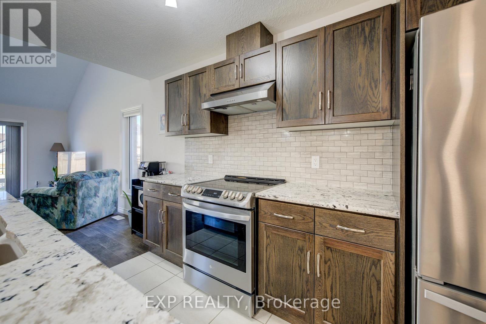 42 Finoro Crescent, Woolwich, Ontario  N3B 0C3 - Photo 18 - X12483466