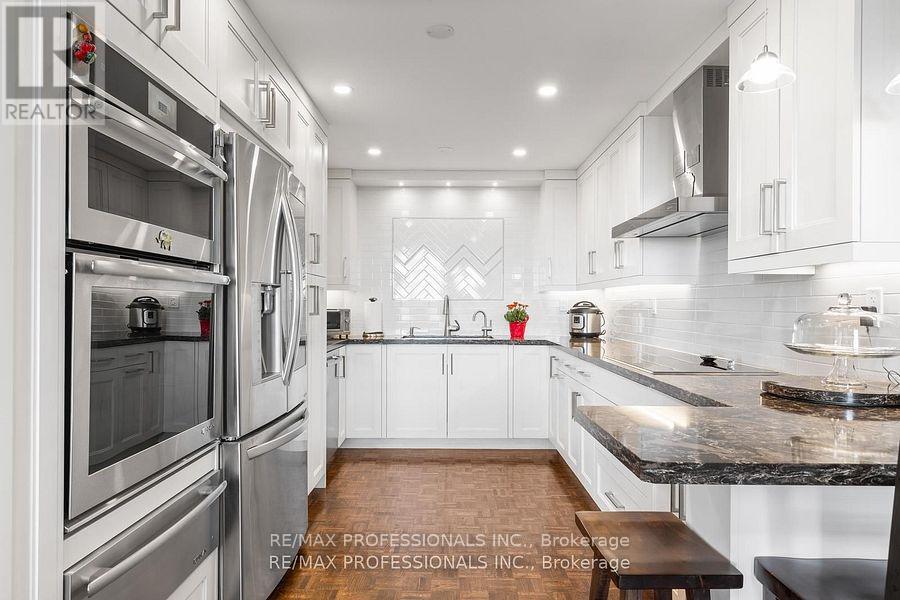 E5 - 296 Mill Road, Toronto, Ontario  M9C 4X8 - Photo 7 - W12483538