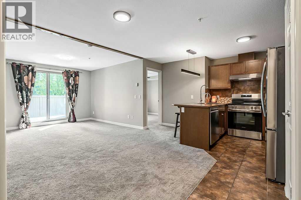 2105, 92 Crystal Shores Road, Okotoks, Alberta  T1S 2M9 - Photo 4 - A2258429