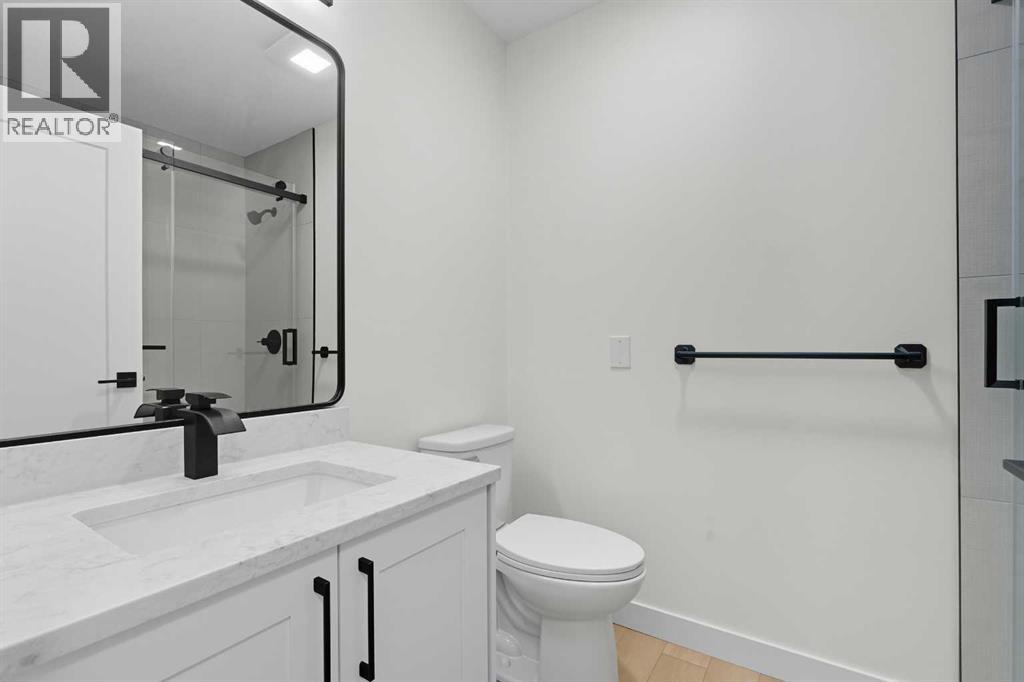 972 Bracewood Rise Sw, Calgary, Alberta  T2W 3C9 - Photo 7 - A2260191