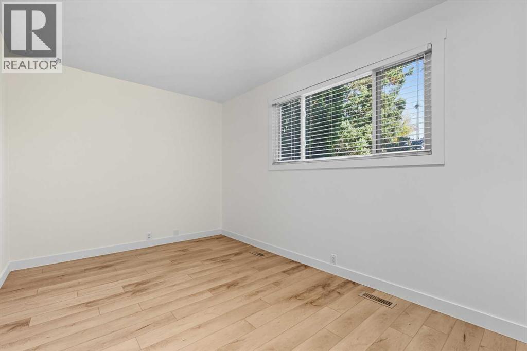 972 Bracewood Rise Sw, Calgary, Alberta  T2W 3C9 - Photo 10 - A2260191