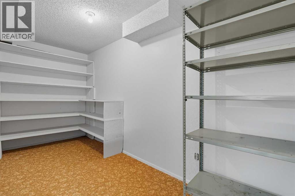 972 Bracewood Rise Sw, Calgary, Alberta  T2W 3C9 - Photo 19 - A2260191