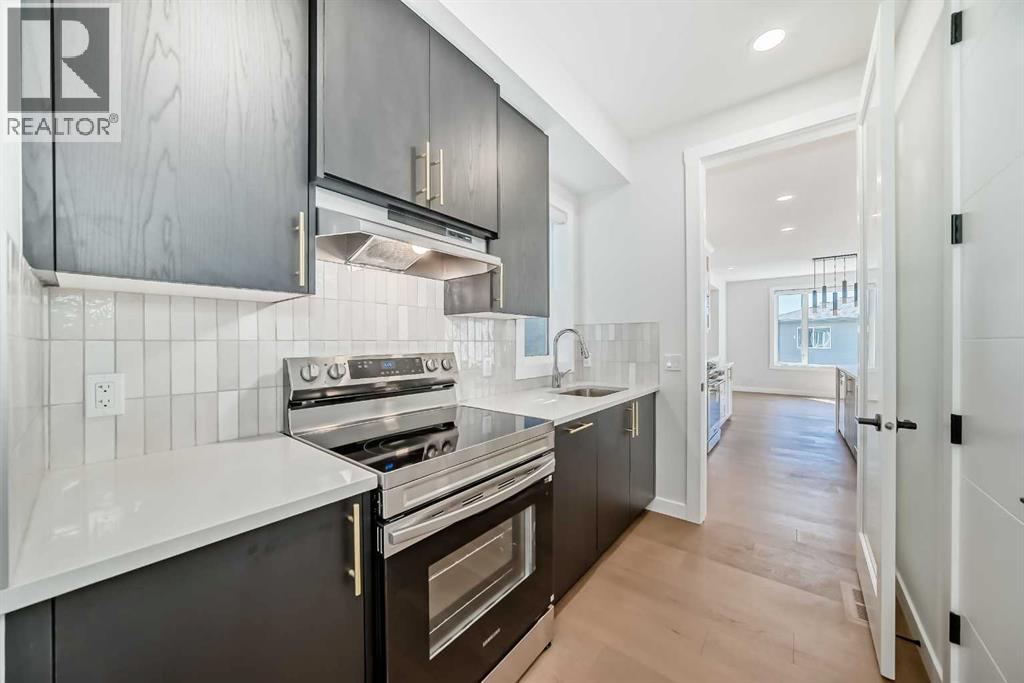 406 Spring Creek Circle Sw, Calgary, Alberta  T3H 6G4 - Photo 12 - A2260703