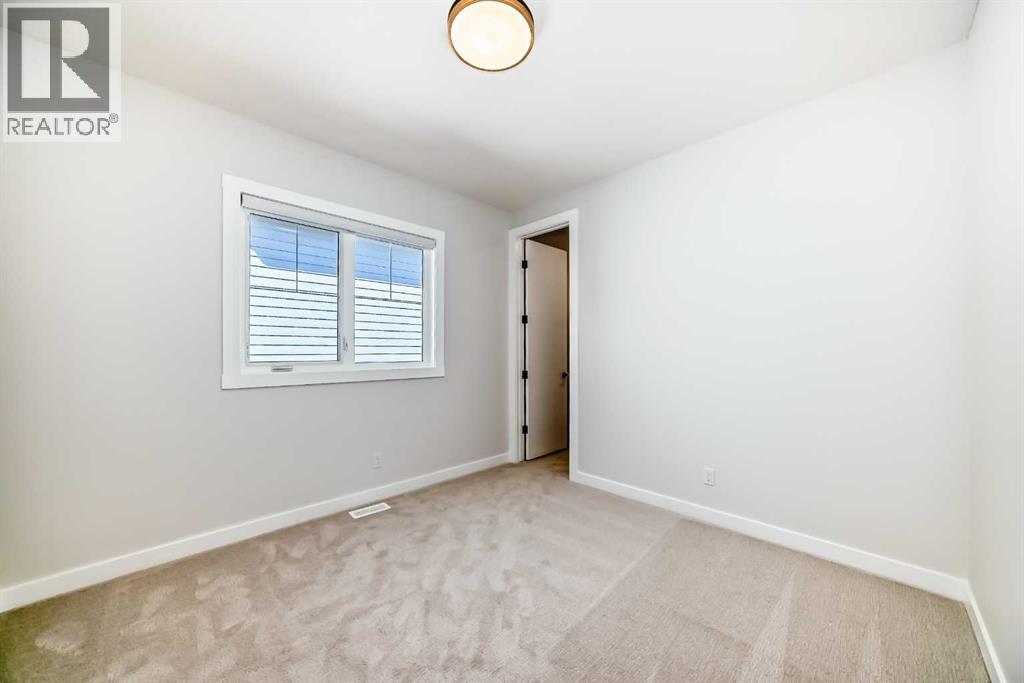 406 Spring Creek Circle Sw, Calgary, Alberta  T3H 6G4 - Photo 35 - A2260703