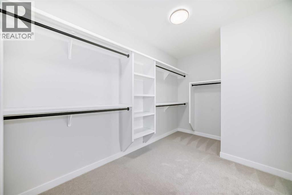 406 Spring Creek Circle Sw, Calgary, Alberta  T3H 6G4 - Photo 32 - A2260703