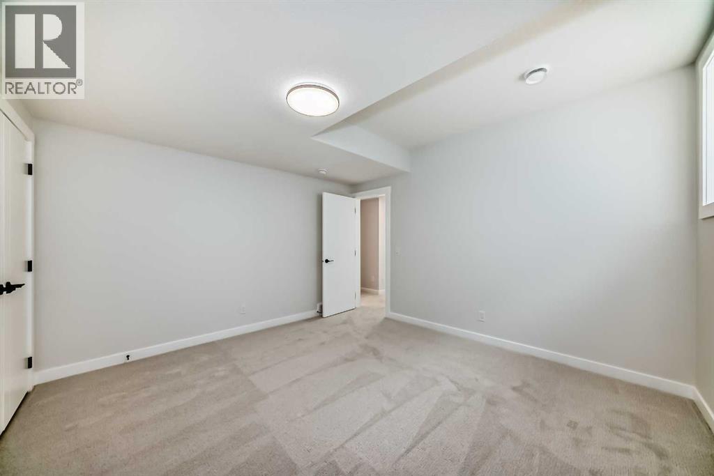 406 Spring Creek Circle Sw, Calgary, Alberta  T3H 6G4 - Photo 44 - A2260703