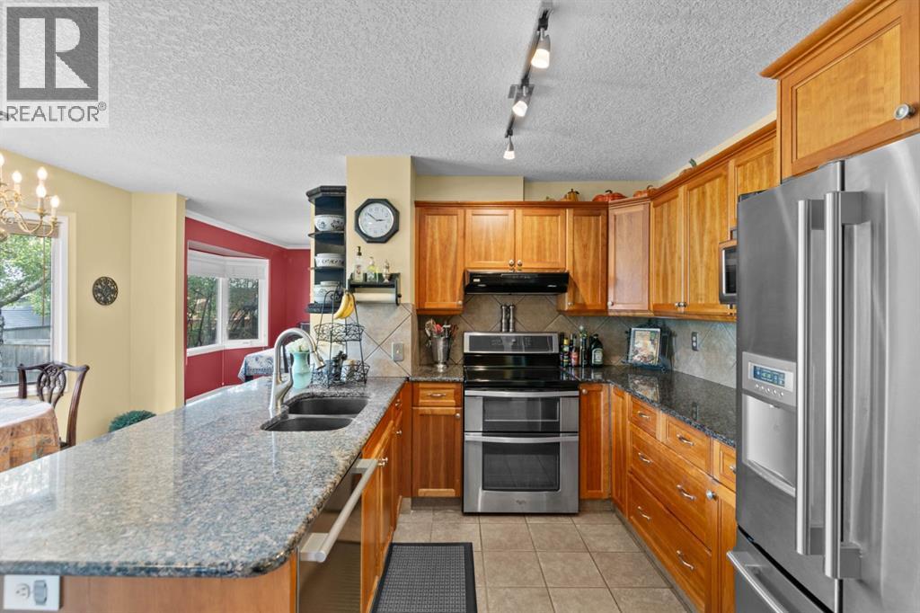 2716 Palliser Drive Sw, Calgary, Alberta  T2V 4G2 - Photo 10 - A2241673