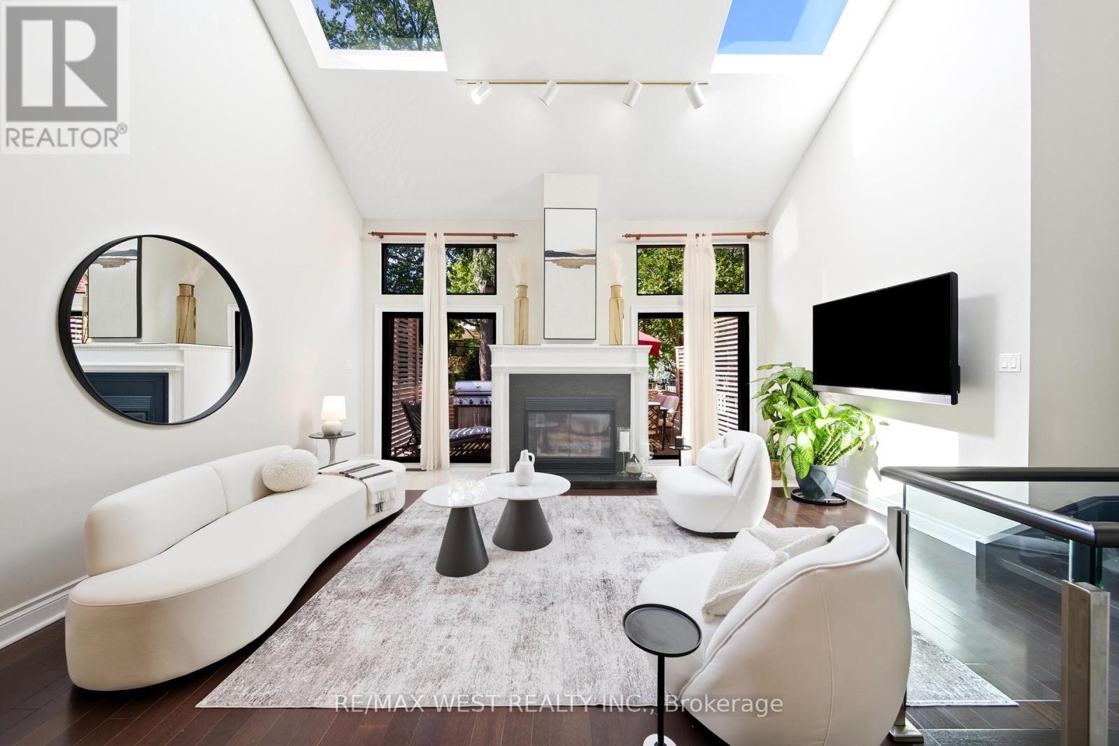 Welcome to 192 Pacific Avenue, a stately 4 bedroom home offering 2,400 sq. ft. of above-ground living space plus a self-contained 2-bedroom basement apartment. Located in one of West Torontos best neighbourhoods, its just steps to the beauty & serenity of High Park, with its scenic trails, playgrounds & sports fields. Its also within walking distance of 3 vibrant high street districts: The Junction, Roncesvalles & Bloor West  each offering a unique mix of shops, cafes & restaurants. Families will appreciate being in the catchment for top-rated Humberside CI and Keele St PS. And commuters will love the easy access to transit  with the subway, GO and UP stations all just a short walk away. Inside, the main floor welcomes you with soaring 10 ft ceilings and a breathtaking living room featuring 17 ft cathedral ceilings, twin skylights, and a cozy fireplace framed by 2 walkouts to a large deck and a very deep backyard. Theres also direct access to a versatile lower-level space  perfect for a gym, TV room or home office. The chef-inspired kitchen features granite countertops, stainless steel appliances including a gas stove with a pot filler, an abundance of cabinetry, and a large breakfast bar that comfortably seats six  ideal for casual meals & entertaining. Also on the main floor is a spacious primary bedroom with an adjoining spa-like full bathroom, a separate laundry room, and rich hardwood flooring throughout. Upstairs, youll find 3 generously sized bedrooms, each with wall-to-wall closets, along with a 4 piece bathroom with a separate soaker tub & walk-in shower. An open loft area overlooks the living room and offers the perfect spot for a home office, library, or quiet reading nook. The lower level apartment includes 2 bedrooms, its own laundry, and a private front entrance  a great option for rental income, in-laws, or extended family. The lower level can be opened up to allow access from inside the house. (id:48254)