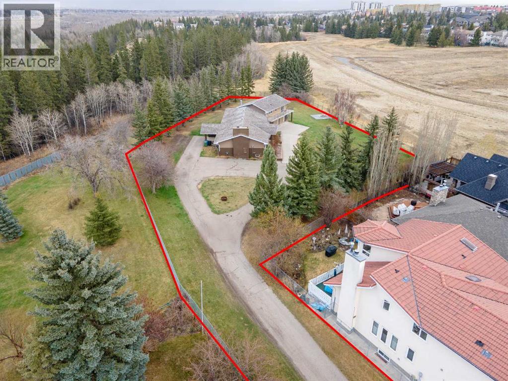 1008 Shawnee Drive Sw, Calgary, Alberta  T2Y 2T9 - Photo 3 - A2247245