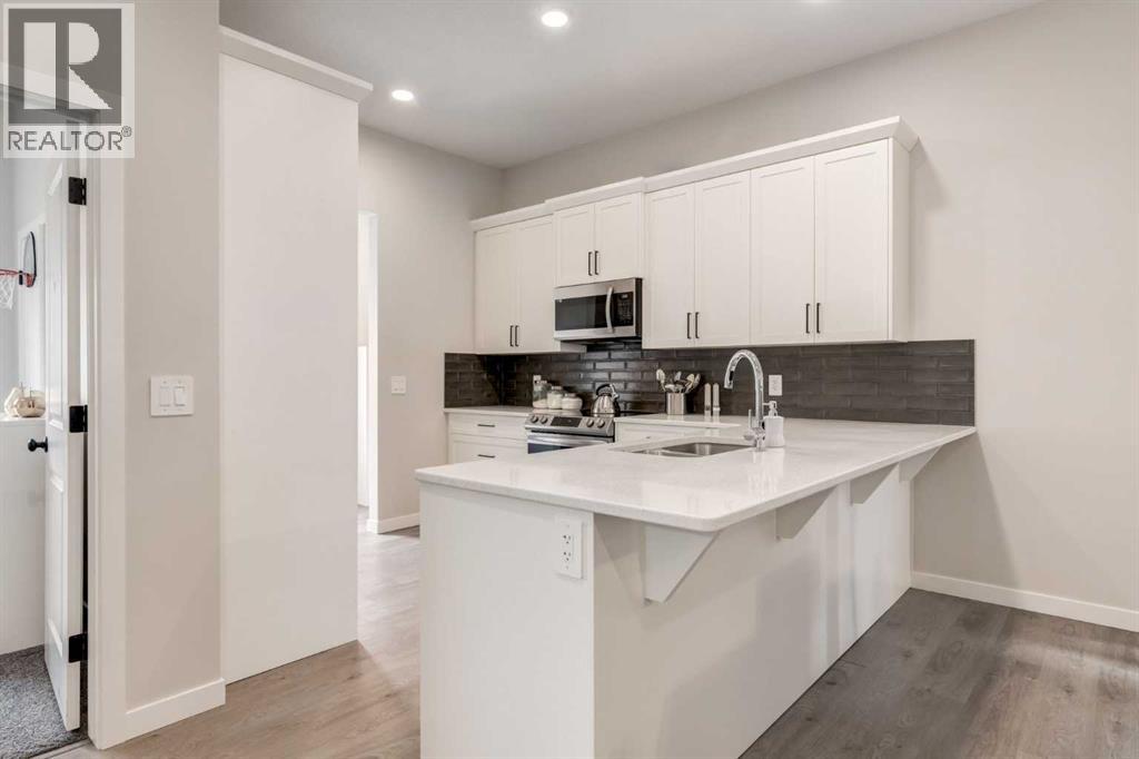 812 Reynolds Manor Sw, Airdrie, Alberta  T4B 5G2 - Photo 9 - A2249629