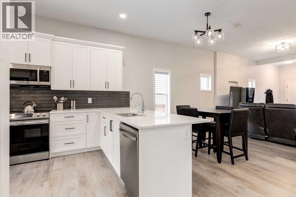 812 Reynolds Manor Sw, Airdrie, Alberta  T4B 5G2 - Photo 7 - A2249629