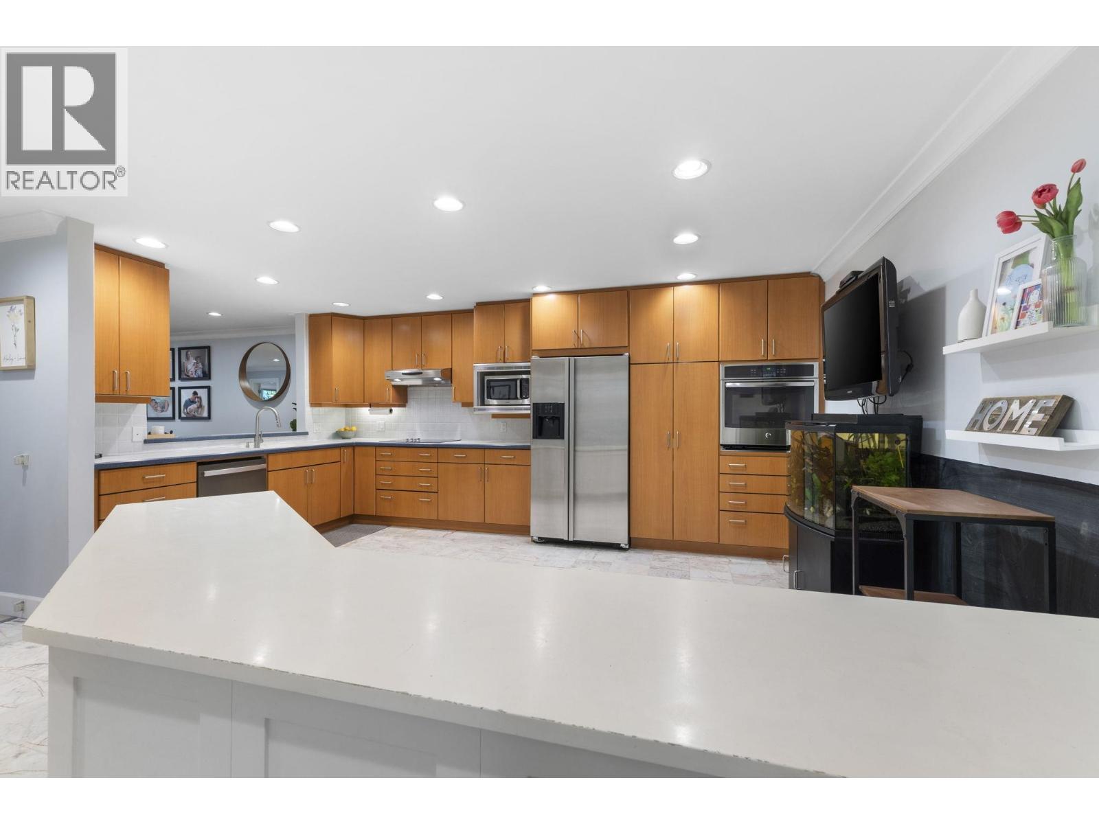 102 1500 Ostler Court, North Vancouver, British Columbia  V7G 2S2 - Photo 10 - R3062018