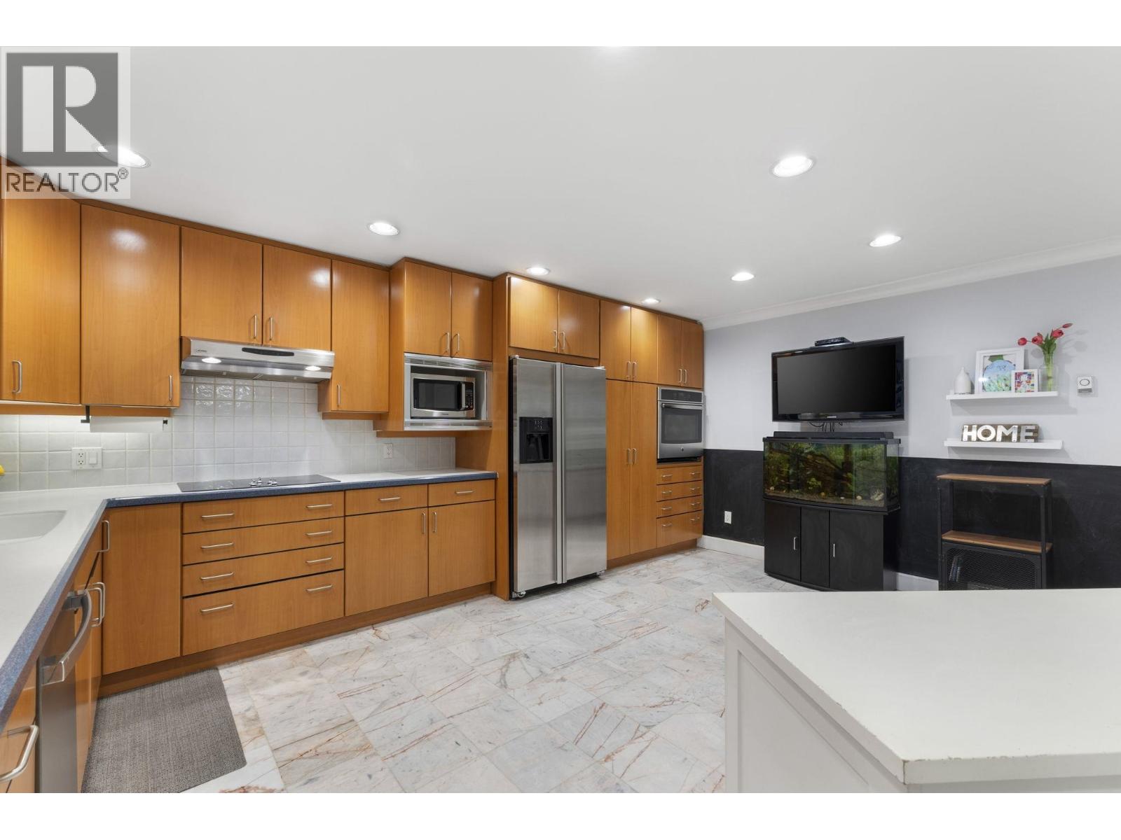 102 1500 Ostler Court, North Vancouver, British Columbia  V7G 2S2 - Photo 11 - R3062018