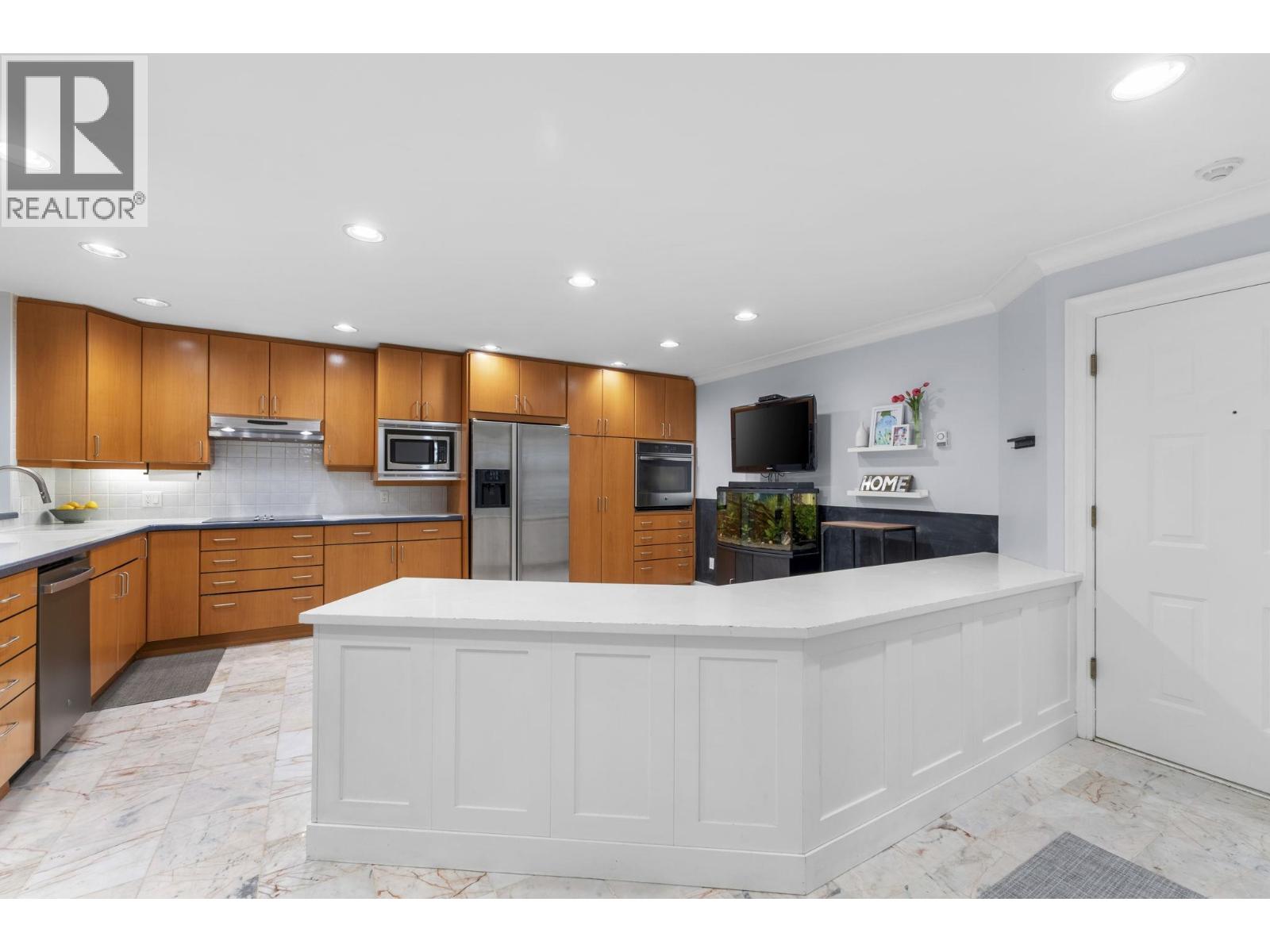 102 1500 Ostler Court, North Vancouver, British Columbia  V7G 2S2 - Photo 9 - R3062018