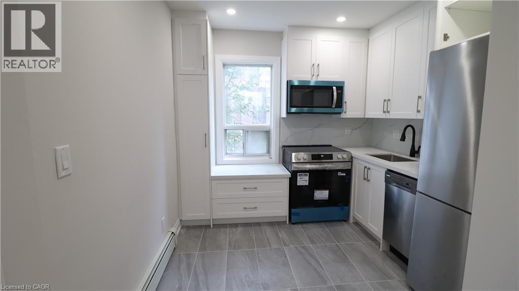 2002 Queen Street E Unit# 3, Toronto, Ontario  M4L 1J3 - Photo 1 - 40782310