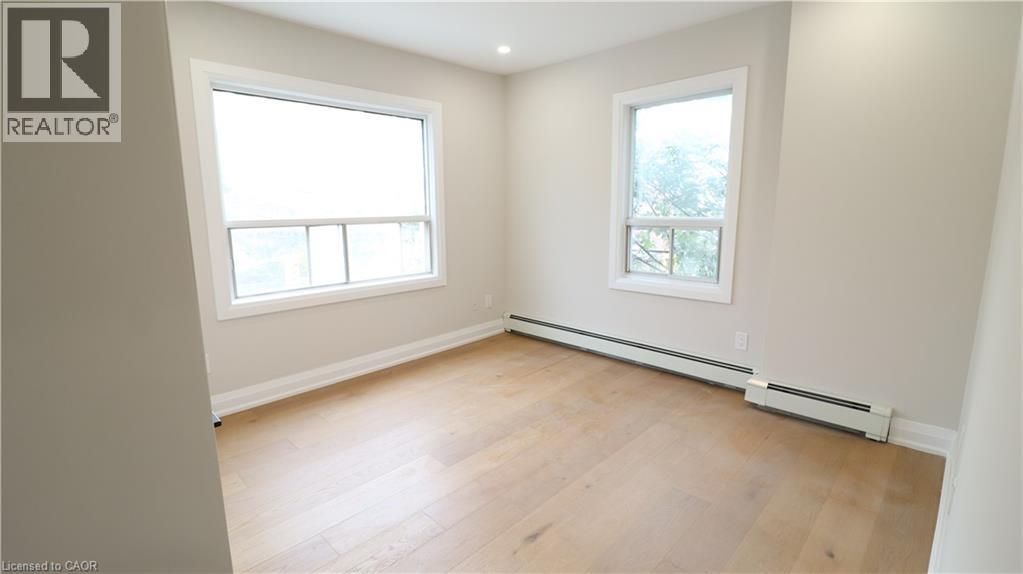 2002 Queen Street E Unit# 3, Toronto, Ontario  M4L 1J3 - Photo 14 - 40782310