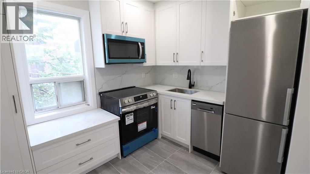 2002 Queen Street E Unit# 3, Toronto, Ontario  M4L 1J3 - Photo 8 - 40782310