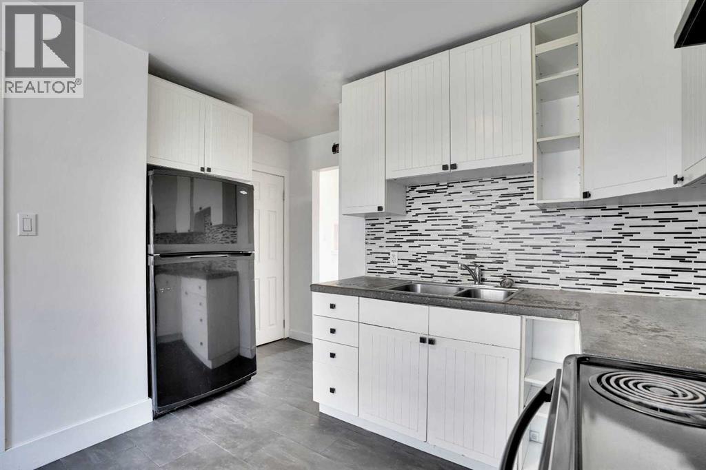 9 Cottage Street Nw, Calgary, Alberta  T2K 1Y4 - Photo 8 - A2256496