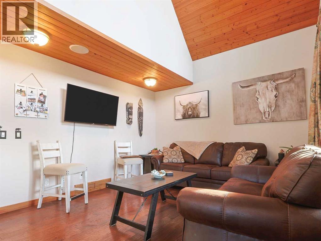 256 Cottageclub Crescent, Rural Rocky View County, Alberta  T4C 1B1 - Photo 11 - A2265981