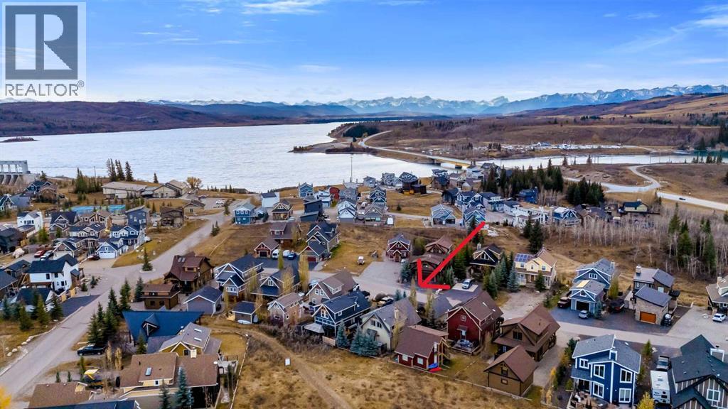 256 Cottageclub Crescent, Rural Rocky View County, Alberta  T4C 1B1 - Photo 28 - A2265981