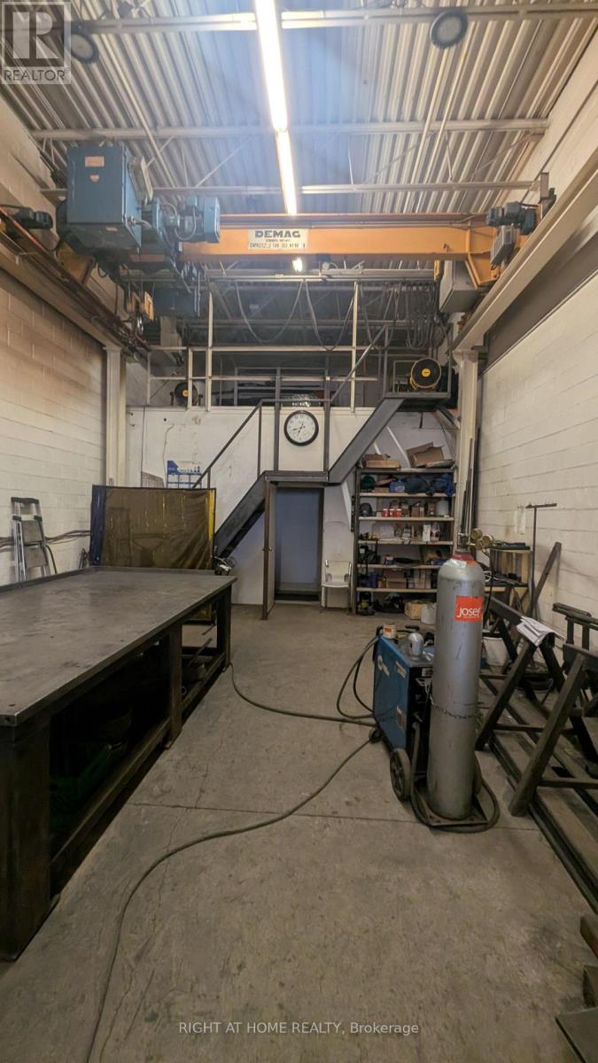 3 - 210 Drumlin Circle, Vaughan, Ontario  L4K 3E3 - Photo 12 - N12484030