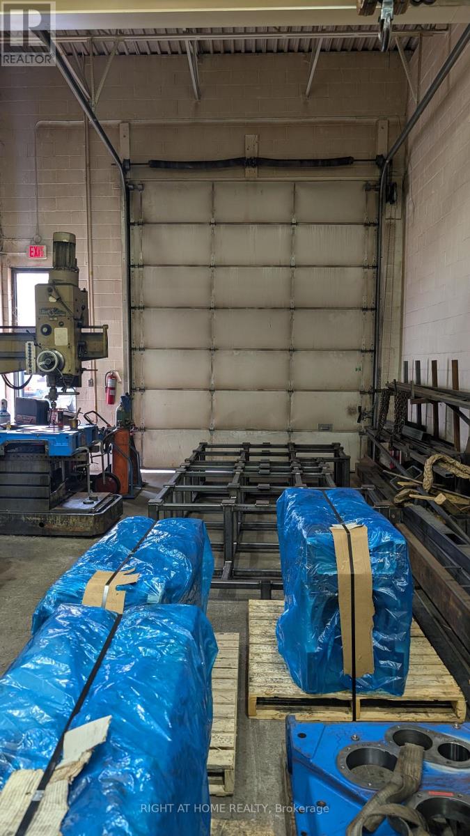 3 - 210 Drumlin Circle, Vaughan, Ontario  L4K 3E3 - Photo 19 - N12484030