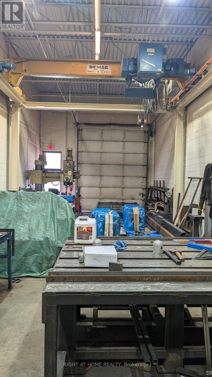 3 - 210 Drumlin Circle, Vaughan, Ontario  L4K 3E3 - Photo 4 - N12484030