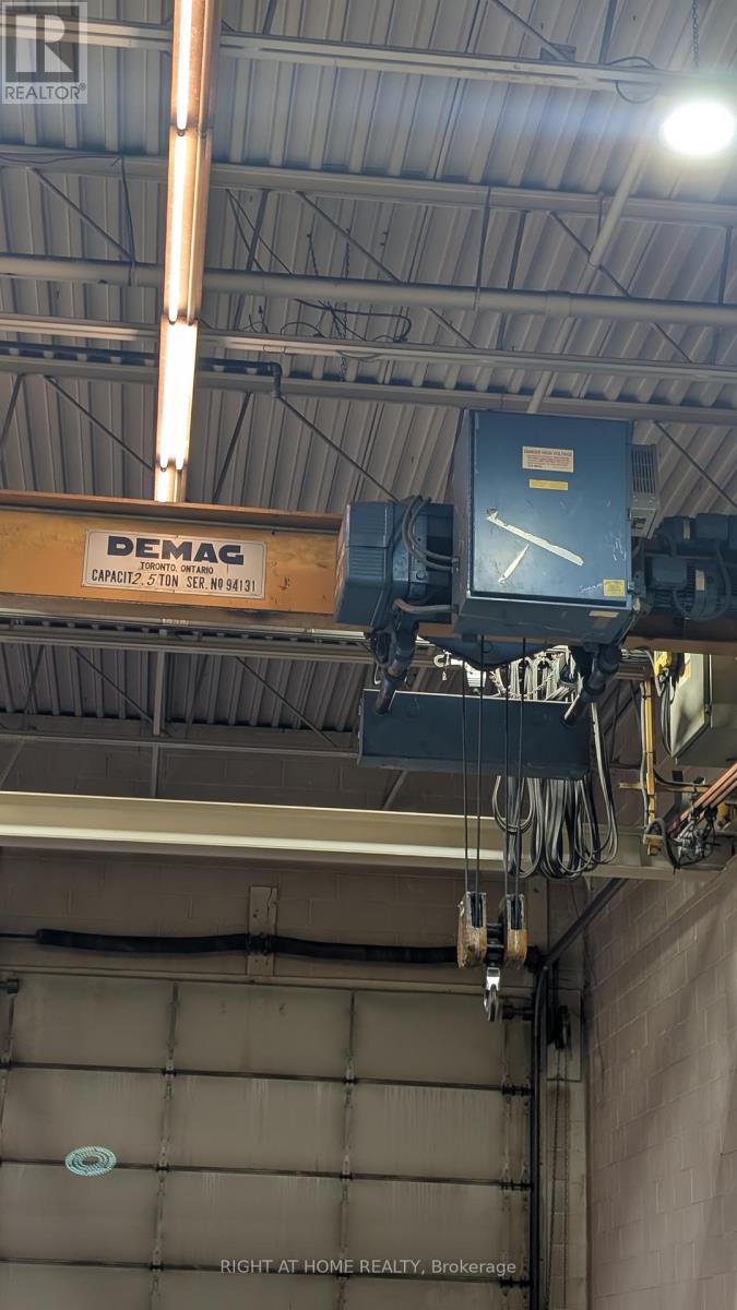 3 - 210 Drumlin Circle, Vaughan, Ontario  L4K 3E3 - Photo 6 - N12484030