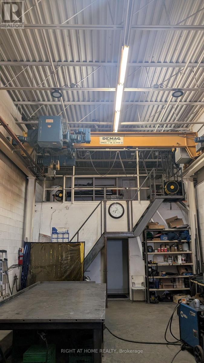 3 - 210 Drumlin Circle, Vaughan, Ontario  L4K 3E3 - Photo 7 - N12484030