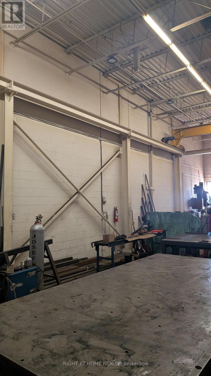 3 - 210 Drumlin Circle, Vaughan, Ontario  L4K 3E3 - Photo 8 - N12484030