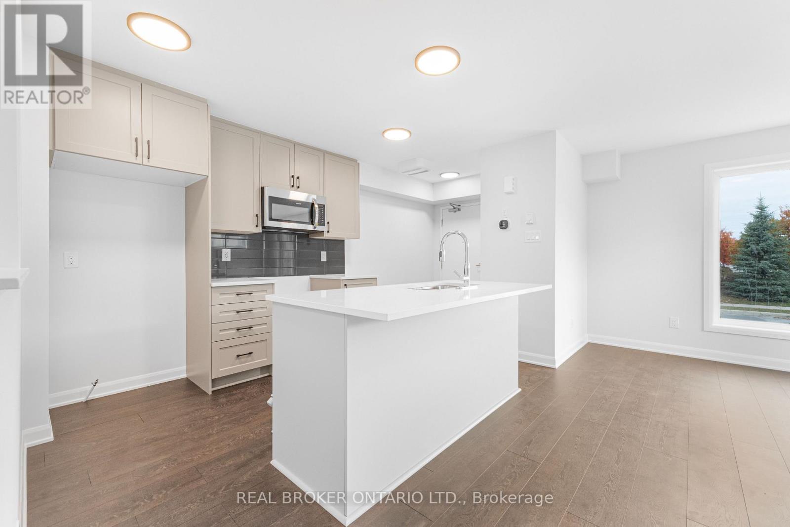 1 - 101 Glenroy Gilbert Drive, Ottawa, Ontario  K2J 7N6 - Photo 4 - X12484146