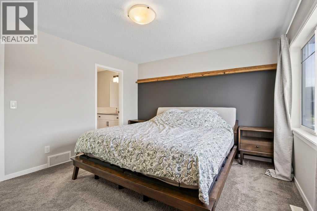 42 Wolf Creek Manor Se, Calgary, Alberta  T2X 3Z8 - Photo 19 - A2261581