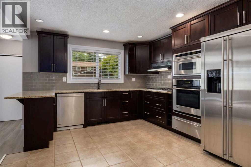 534 Cantrell Drive Sw, Calgary, Alberta  T2W 2K7 - Photo 4 - A2251782