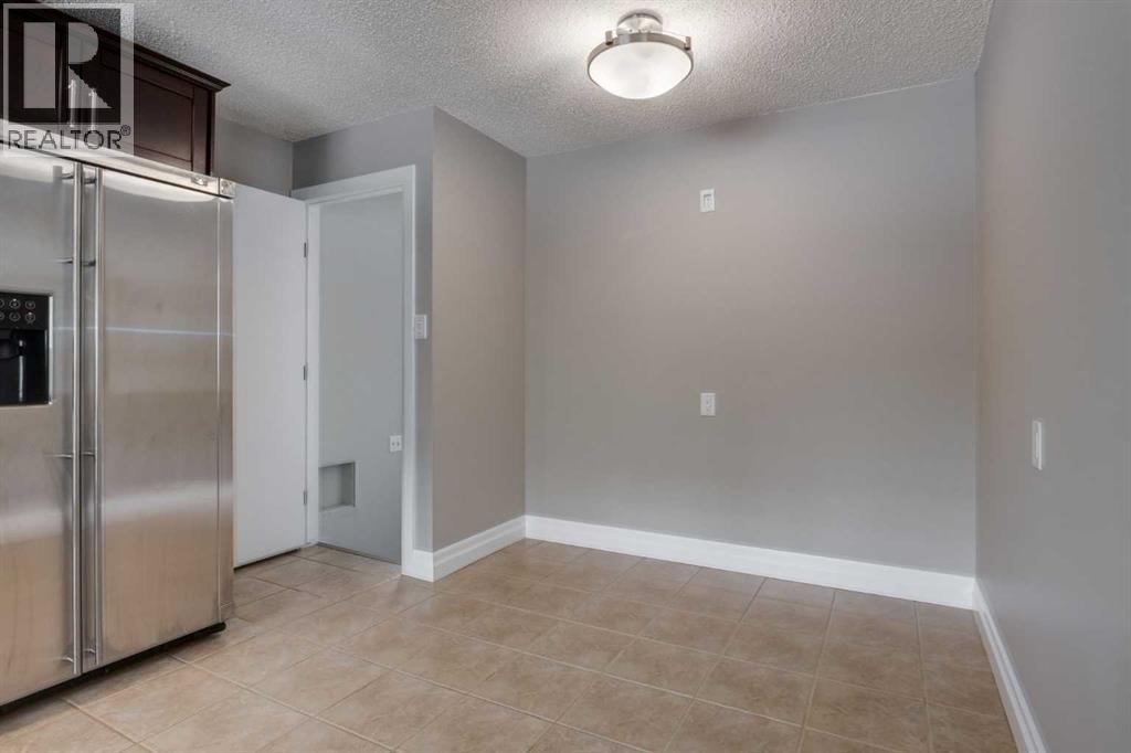 534 Cantrell Drive Sw, Calgary, Alberta  T2W 2K7 - Photo 5 - A2251782