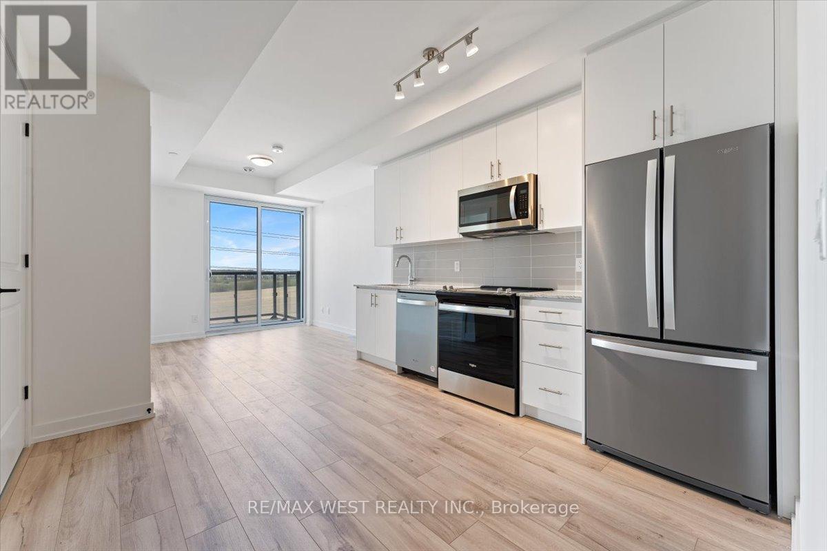 411 - 335 Wheat Boom Drive, Oakville, Ontario  L6H 7C2 - Photo 4 - W12484269