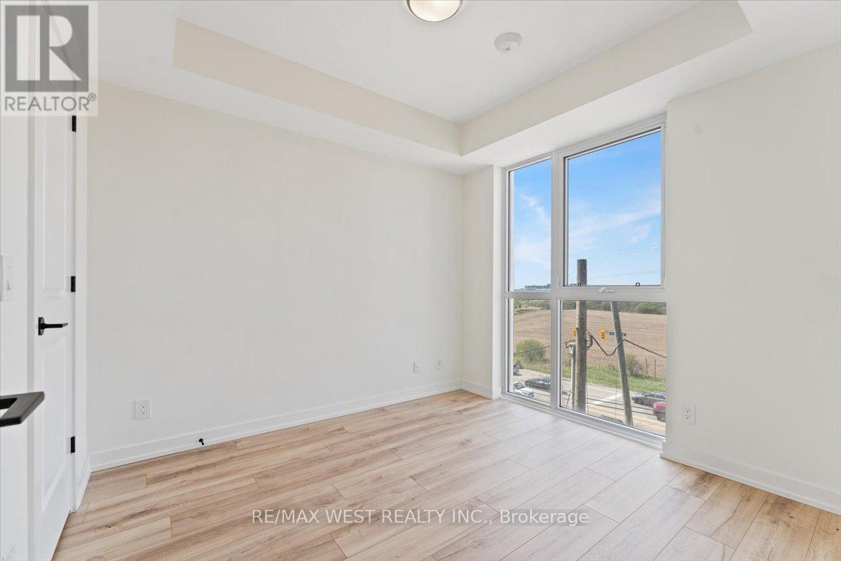 411 - 335 Wheat Boom Drive, Oakville, Ontario  L6H 7C2 - Photo 9 - W12484269