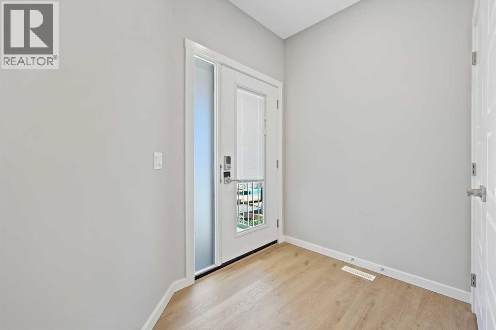 112 Key Cove Sw, Airdrie, Alberta  T4B 3N8 - Photo 5 - A2248158