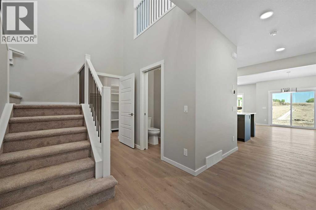 7 Heritage Link, Cochrane, Alberta  T4C 2J8 - Photo 6 - A2248165