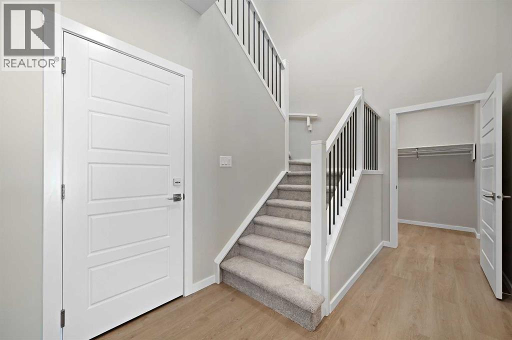 7 Heritage Link, Cochrane, Alberta  T4C 2J8 - Photo 5 - A2248165