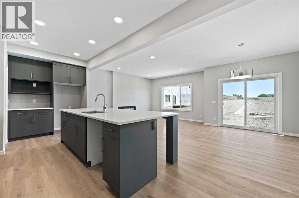 7 Heritage Link, Cochrane, Alberta  T4C 2J8 - Photo 7 - A2248165