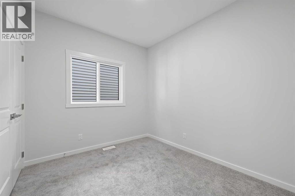 11 Heritage Link, Cochrane, Alberta  T4C 2J8 - Photo 9 - A2248171