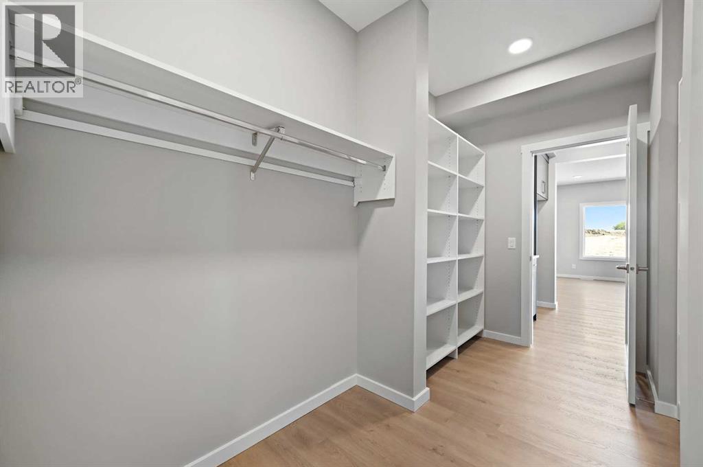 7 Heritage Link, Cochrane, Alberta  T4C 2J8 - Photo 22 - A2248165