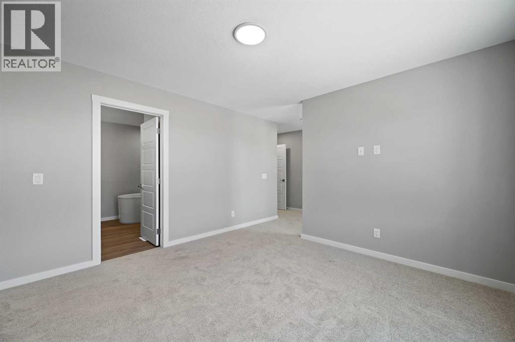 7 Heritage Link, Cochrane, Alberta  T4C 2J8 - Photo 33 - A2248165