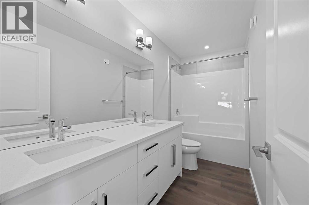 11 Heritage Link, Cochrane, Alberta  T4C 2J8 - Photo 31 - A2248171