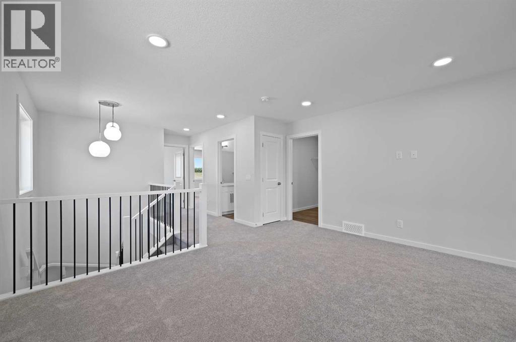 11 Heritage Link, Cochrane, Alberta  T4C 2J8 - Photo 27 - A2248171