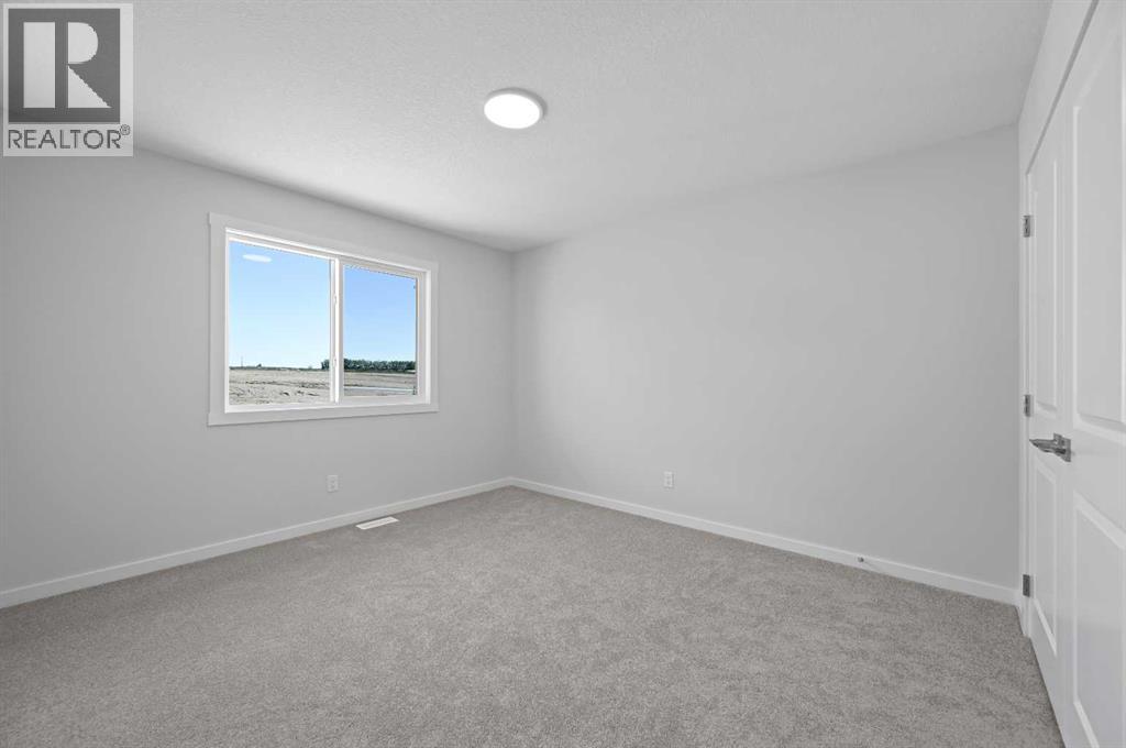 11 Heritage Link, Cochrane, Alberta  T4C 2J8 - Photo 30 - A2248171