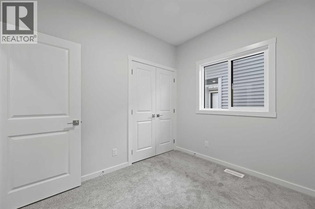 11 Heritage Link, Cochrane, Alberta  T4C 2J8 - Photo 10 - A2248171
