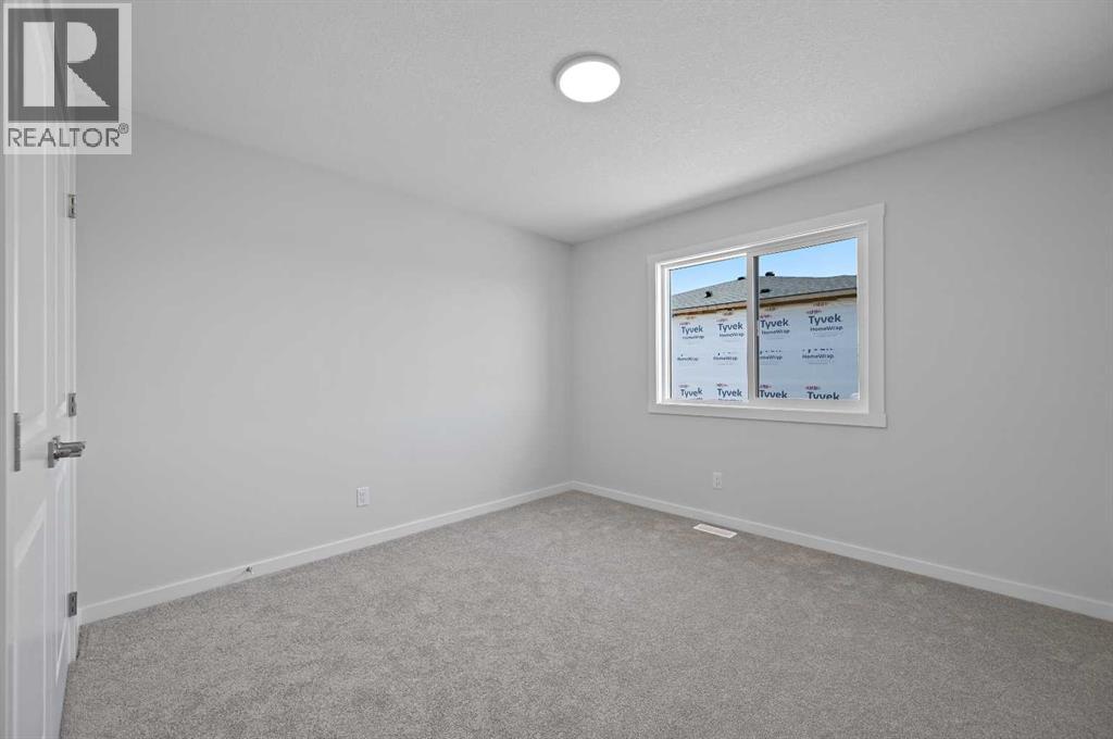 11 Heritage Link, Cochrane, Alberta  T4C 2J8 - Photo 29 - A2248171