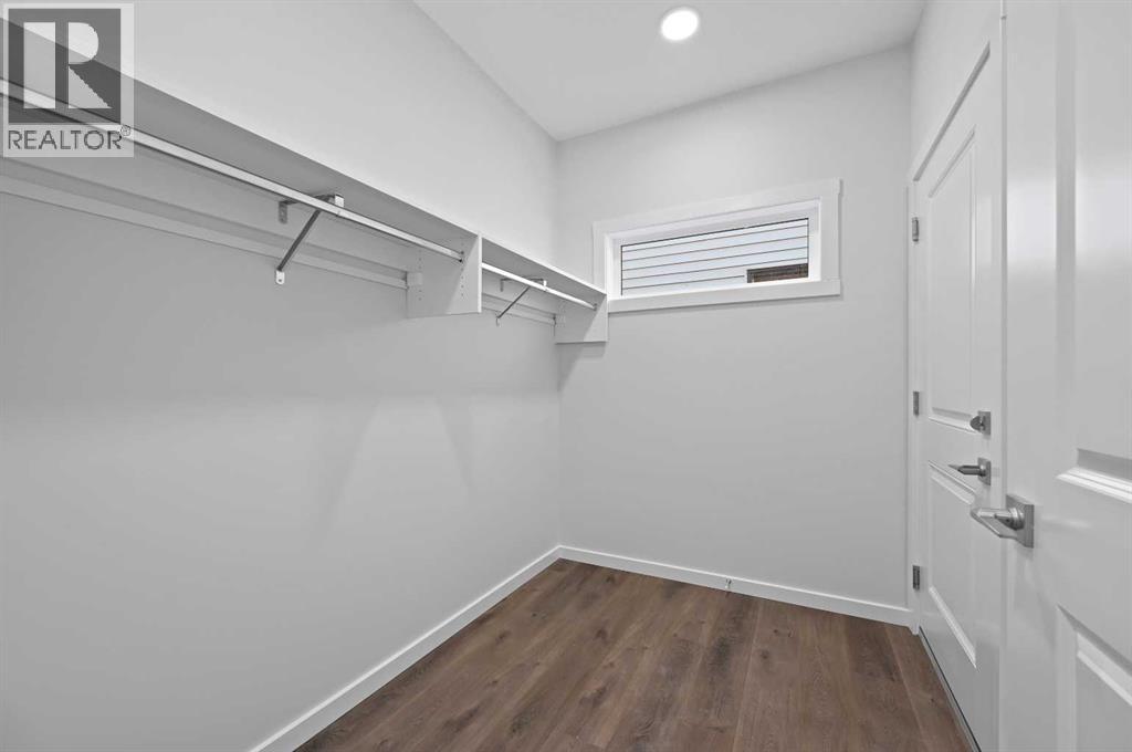 11 Heritage Link, Cochrane, Alberta  T4C 2J8 - Photo 7 - A2248171