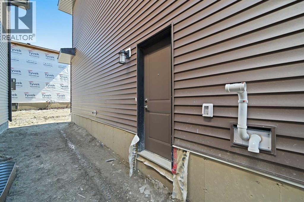 11 Heritage Link, Cochrane, Alberta  T4C 2J8 - Photo 41 - A2248171
